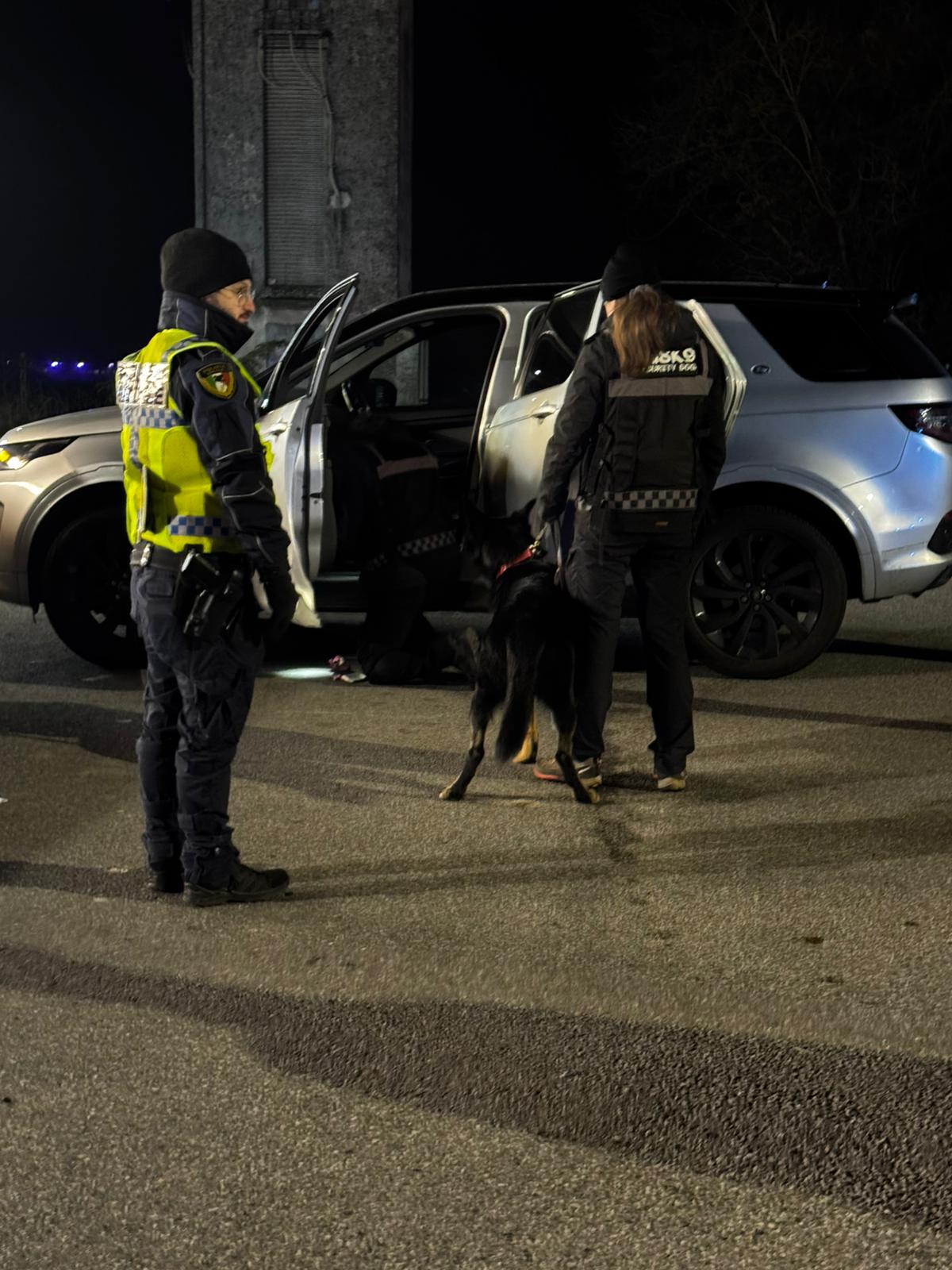 a stone building on a small island with water